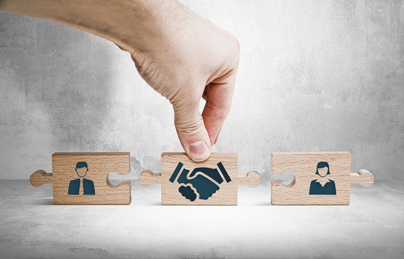 Wooden blocks with an icon of a woman and a man and mediation. Concept of mediation between spouses, divorce. Divorce proceedings before the Court. The role of the mediator. Wooden blocks with an icon of a woman and a man and mediation. Concept of mediation between spouses, divorce. Divorce proceedings before the Court. The role of the mediator.