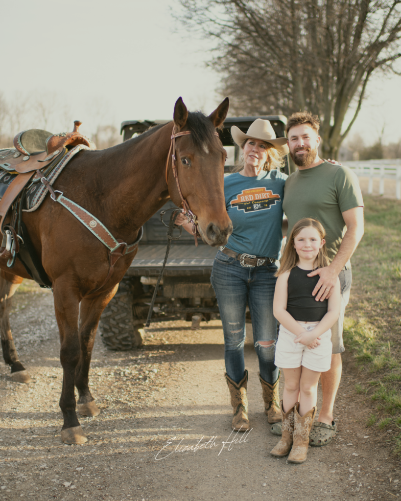 Divorce Mediation Attorney Elizabeth Hill with man, child, and horse.